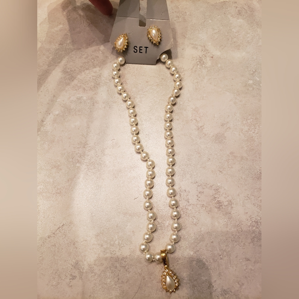 Pearl and rhinestone necklace with matching pierced earrings. Never worn.
